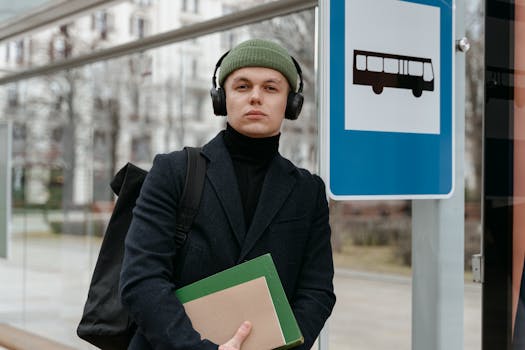 A rural student waiting for a bus
